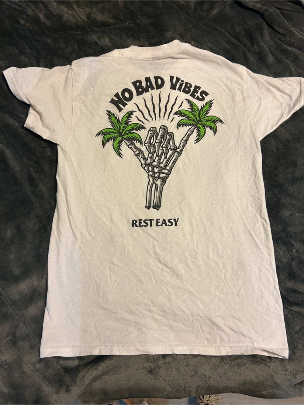 Graphic White Tee with Skeleton Palm Design - "No Bad Vibes"
